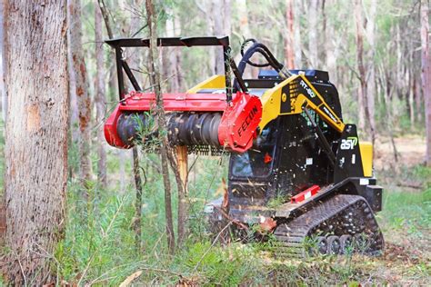 operate a skid steer forest tree|skid steer forestry attachments.